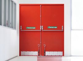 Double emergency fire exit door in a commercial building